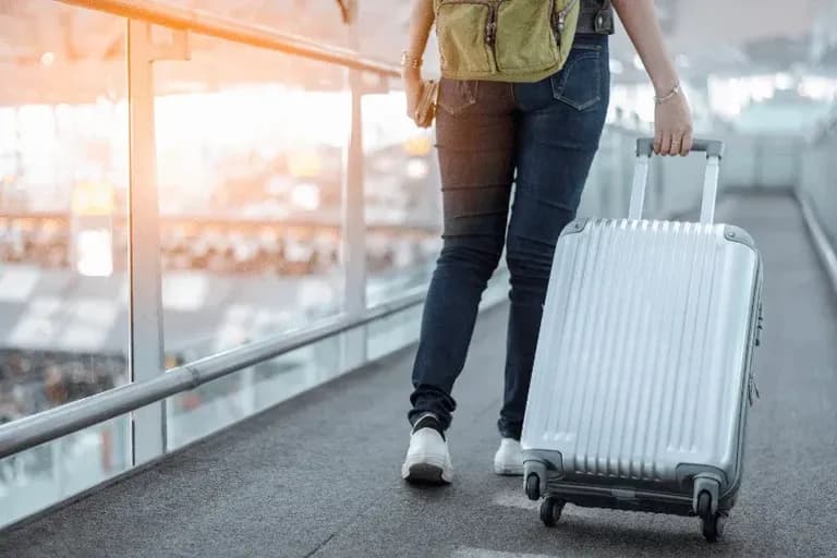 EU to end fees for small carry-ons and family seating on flights